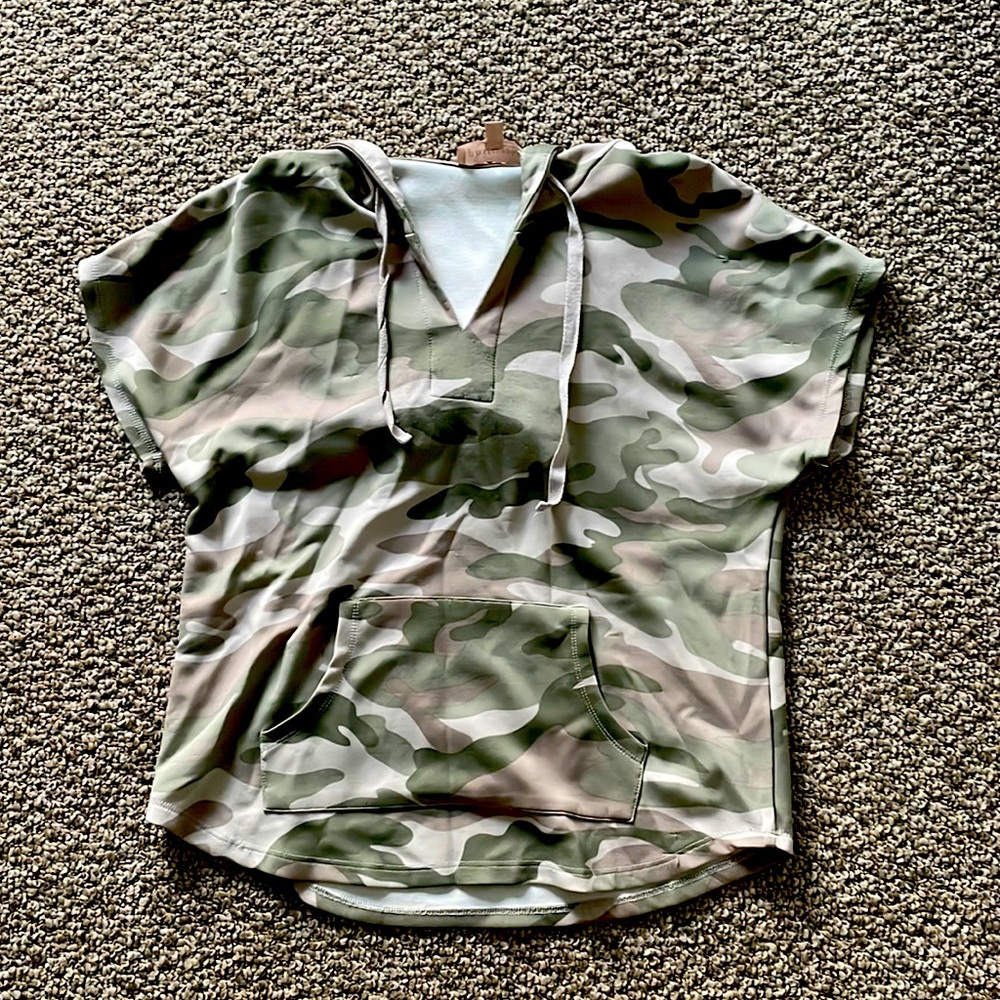 Very soft t-shirt with a hoodie! Has a thicker material than normal shirts!